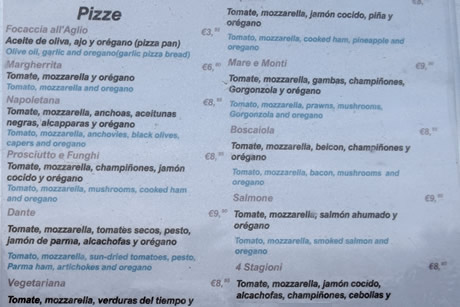 carta con precios de pizzas en el restaurante dante