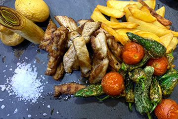 bonita tapa de carne y verduras en fogon de galicia